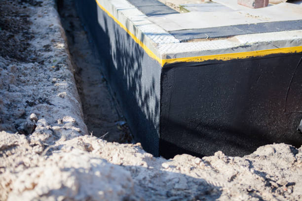 Professional Foundation Crack Repair technician working in Maybee, MI